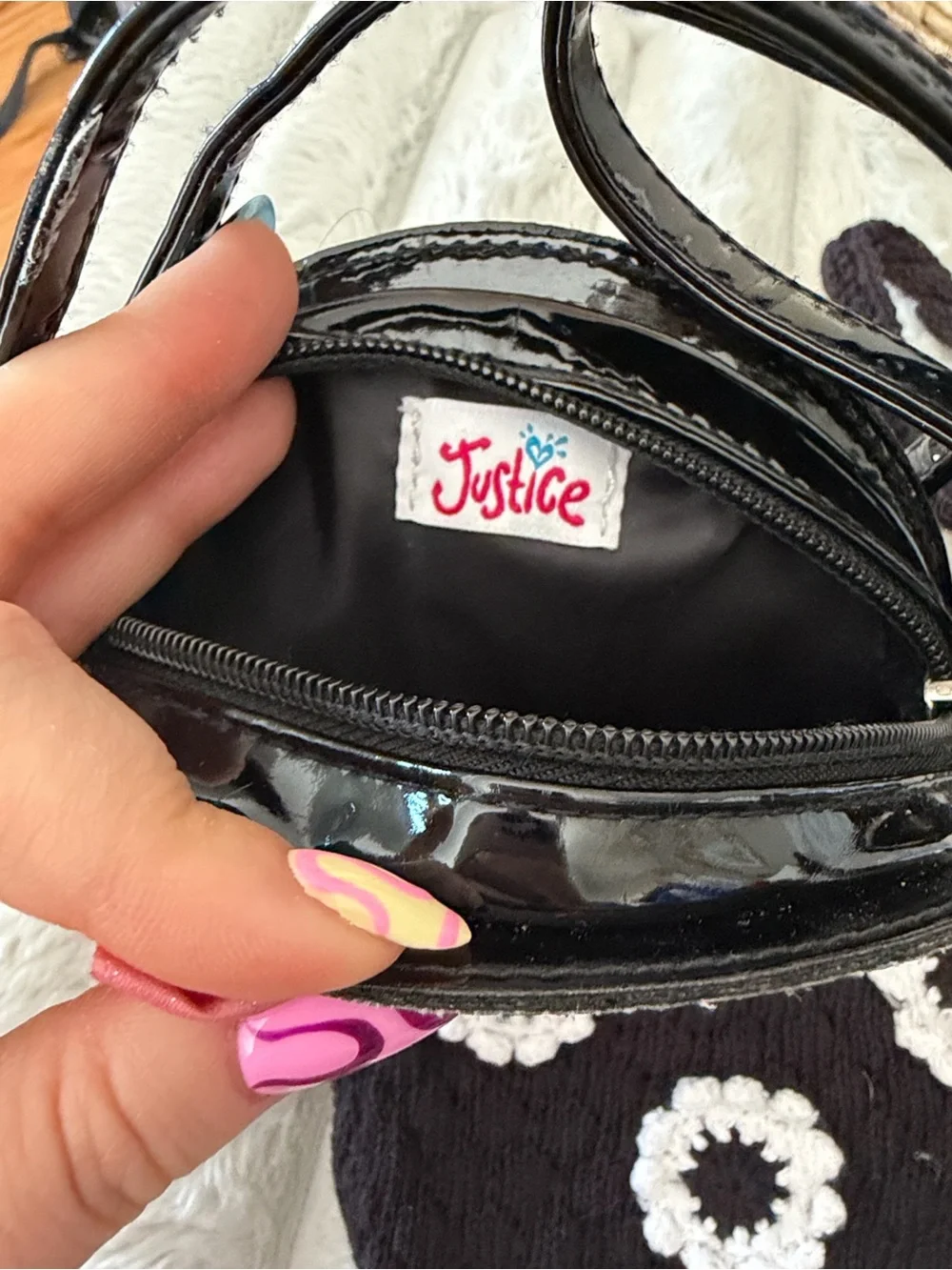 Justice Black Penguin & Crochet Crossbody Bag with White Flower Appliqués